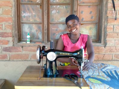 1. Maria, a third-level tailoring training beneficiary